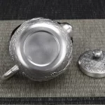 「银龙壶 · Silver Dragon Flame」 — 200ml Handmade 999 Pure Silver Boiling Teapot (Dragon Relief · Reduction-Fired Finish · Japanese-Inspired Form) - Image 5