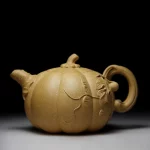 「蔓生壶 · Vine Bloom」 — 340ml Handmade Yixing Purple Clay Teapot (Raw Ore Section Mud · Biomimetic Pumpkin Form · Zisha Teaware)