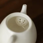 「羊脂玉瓷壶 · Cloudglow」 — 90ml Sheep Fat Jade Porcelain Teapot (Handmade Miniature Gongfu Pot · Built-in Filter · Household & Travel-Friendly Brewing Vessel) - Image 5