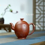 「香禽壶 · Incense Wing」 — 300ml Handmade Yixing Purple Clay Teapot (Raw Ore Purple Clay · 9-Hole Filter · Bird & Blossom Engraving)