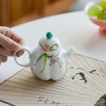 「锦瓷南瓜壶 · Blooming Harvest」 — 280ml Hand-Painted Pumpkin-Shaped Ceramic Teapot (China Porcelain · Deep Infuser · Floral Motif · Multi-Occasion Gift Teaware) - Image 2