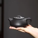 「砺影藏真 · Grindstone Form」 — 190ml Handcrafted Yixing Purple Clay Teapot | Ball Hole Filter for Gongfu Brewing · Famous Artisan Edition - Image 4