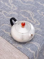 「清影壶 · Clear Whisper」 — 90ml Handmade 999 Sterling Silver Teapot (Xishi Form · Frosted Texture · Red Glass Finial · Compact Gongfu Vessel) - Image 5