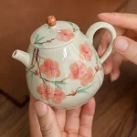 「绘影龙角壶 · Prism Bloom」 — 200ml Hand-Drawn Ceramic Teapot (Multi-Faceted Dragon Egg Form · White Porcelain Base · Built-in Filter · Chinese Style Motif) - Image 3