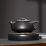 「砺影藏真 · Grindstone Form」 — 190ml Handcrafted Yixing Purple Clay Teapot | Ball Hole Filter for Gongfu Brewing · Famous Artisan Edition