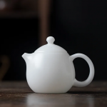 「冰瓷玉壶 · Glacier Bloom」 — 1.0L Ice Jade Porcelain Teapot (High-End Handmade Ceramic · Ball Hole Filter · Luxury Gongfu Brewing Vessel for Household or Gift Use)