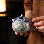 「西式龙凤壶 · Celestial Harmony」 — 300ml Handmade Blue-and-White Porcelain & 999 Sterling Silver Teapot (Dragon & Phoenix Relief · Gilded Overlay · Gongfu Fusion Teaware)