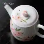 「桃影壶 · Spring Whisper」 — 130ml Pure Hand-Painted Peach Blossom Teapot (Modern Chinese Style · Porcelain Clay Body · Built-in Chhai Filter · Handmade for Puer & Gongfu Brewing) - Image 6
