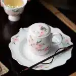 「桃影壶 · Spring Whisper」 — 130ml Pure Hand-Painted Peach Blossom Teapot (Modern Chinese Style · Porcelain Clay Body · Built-in Chhai Filter · Handmade for Puer & Gongfu Brewing) - Image 2